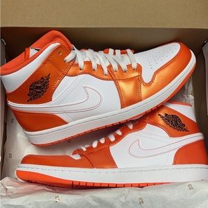 Brand new never worn Jordan Retro 1 mid in Metallic Orange.